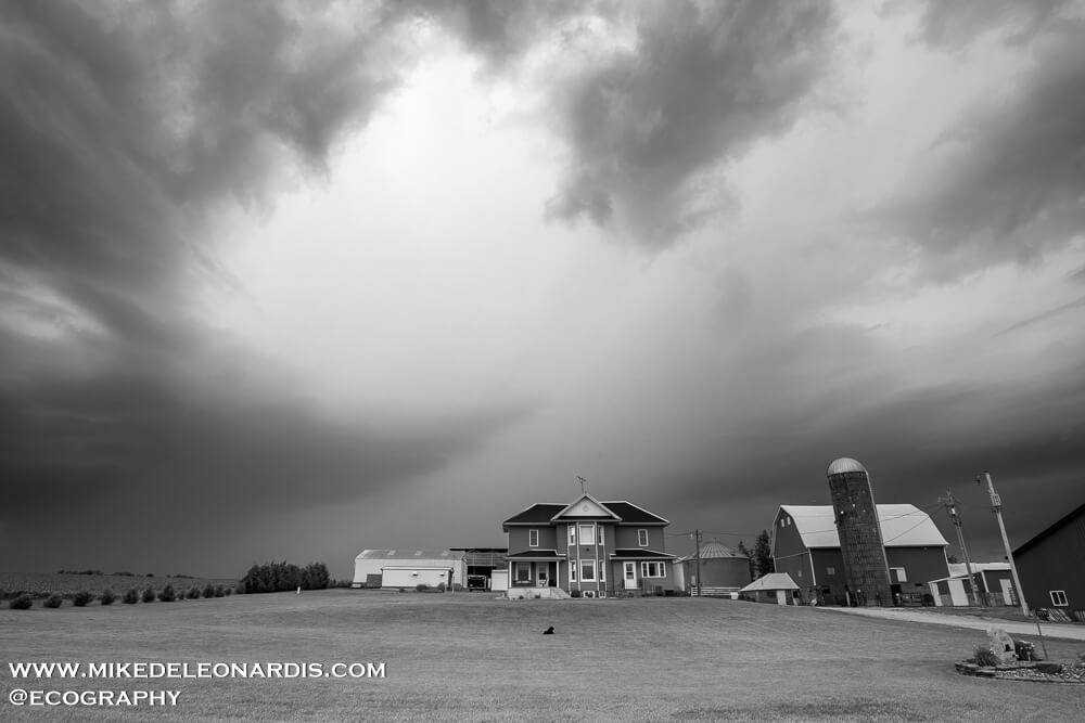 Iowa Farmhouse With Approaching Storm